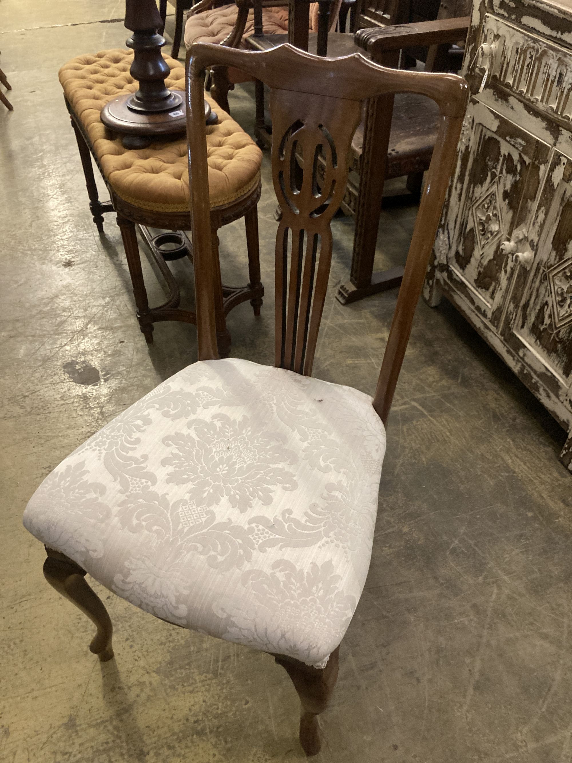 A set of eight Edwardian mahogany dining chairs (two with arms)
